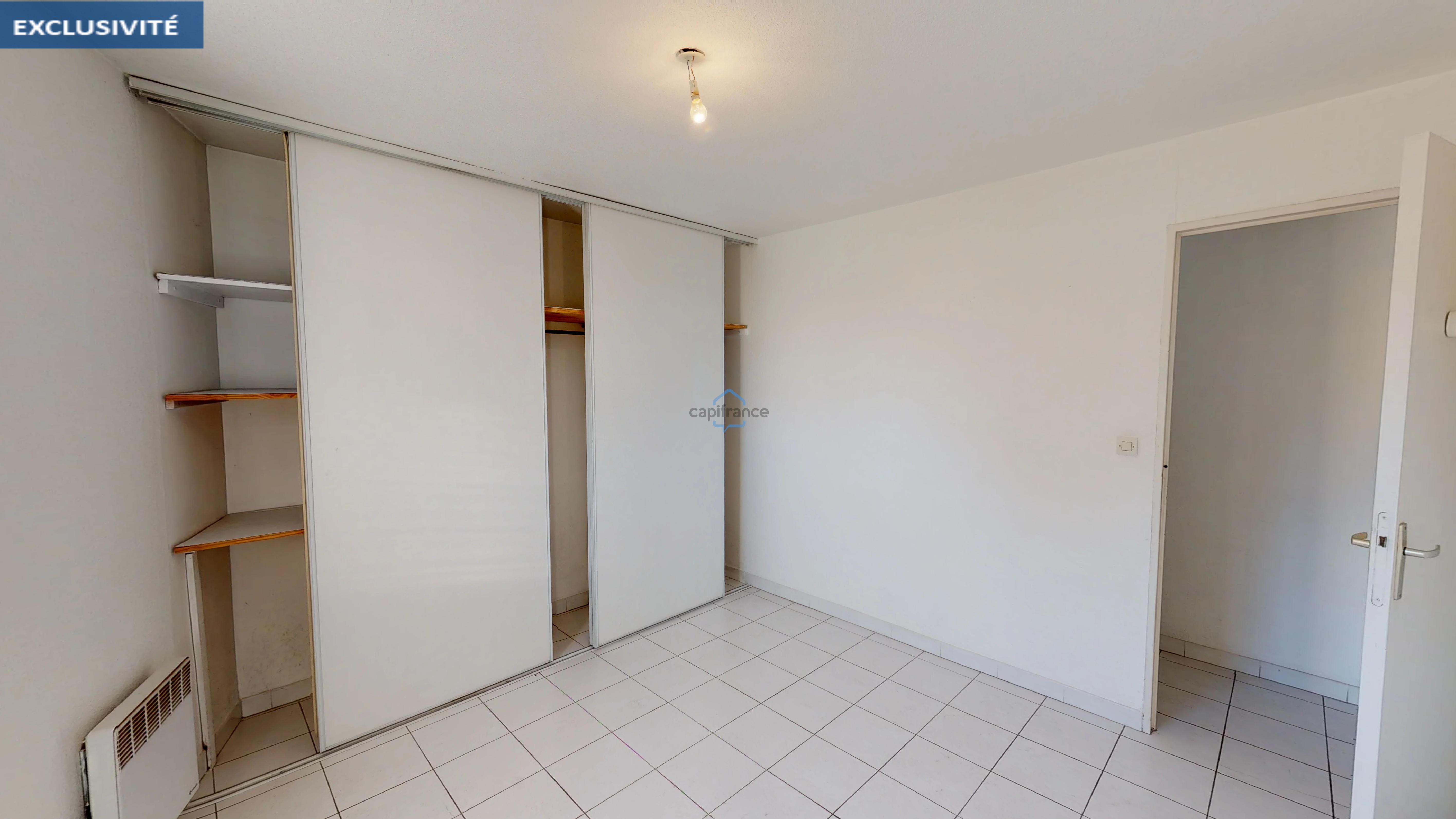 Dpt Hérault (34), à vendre LUNEL appartement T2 de 48 m² avec parking